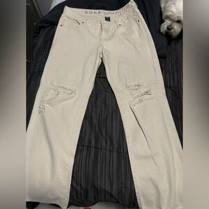 Distressed off white Jeans